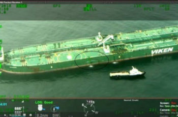 NTSB: Mates share blame for scalloper, tanker collision The collision left a 30-foot gash in the side of the tanker. Coast Guard image