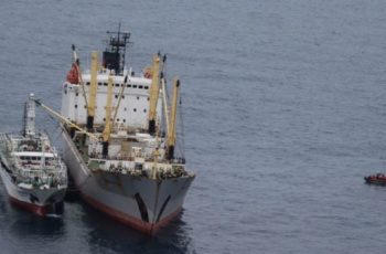 Coast Guard on long patrol against illegal fishing in North Pacific A boarding team on an over-the-horizon cutter boat from Coast Guard cutter Mellon approaches the Chinese-flagged fishing vessel Lurong Yuan Yu 899 as it offloads catch onto the Russian-flagged transshipment Vessel Pamyat in the North Pacific Ocean, July 15, 2019. Coast Guard photo.