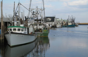 Cash on the line: Federal funds for fishermen and fishing communities The fishing fleet at Belford, N.J., survived Hurricane Sandy in 2012 but the 9-foot storm surge heavily damaged port facilities. Kirk Moore photo.