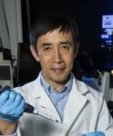 Ximing Guo of the Rutgers University Haskins Shellfish Laboratory. Rutgers photo.