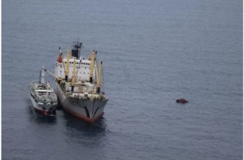 They’re back: Coast Guard air patrols spot fishing incursions near Hawaii, Guam A boarding team from the Coast Guard cutter Mellon heading toward the Chinese-flagged fishing vessel Lurong Yuan Yu 899 as it offloads catch onto the Russian-flagged transshipment Vessel Pamyat in the North Pacific Ocean, July 15, 2019. Coast Guard air crews recently spotted foreign-flag vessels illegally fishing in U.S. waters near Guam and Hawaii. Coast Guard photo.